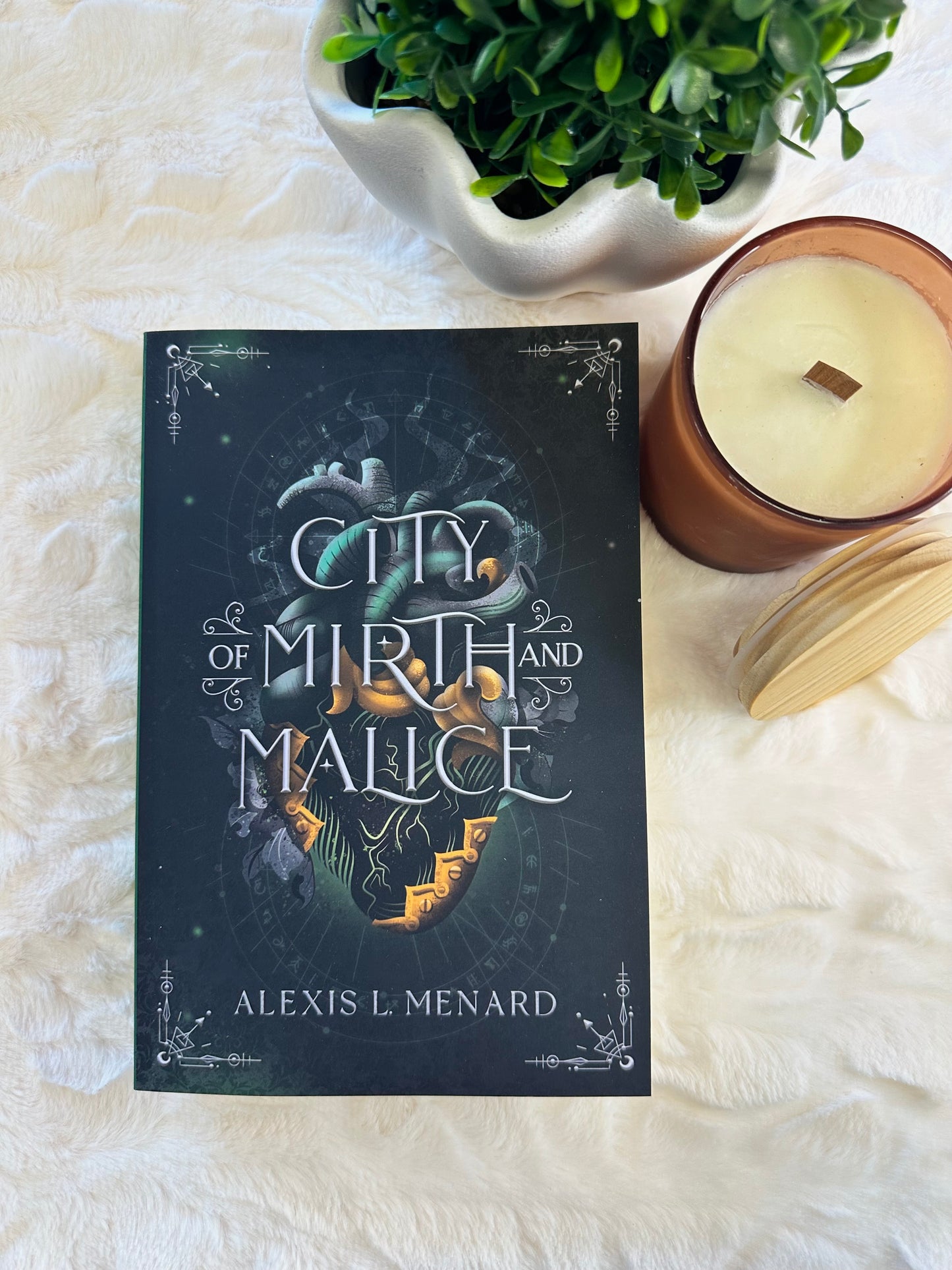 City of Mirth and Malice by Alexis L Menard